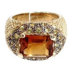 Ring mit gelbem Saphir und einem Topas im Mittelstep-Schliff aus 14 Karat Gold