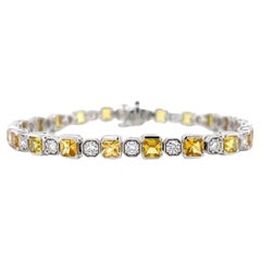 Bracciale con zaffiro giallo e diamante tondo a brillante in oro bianco