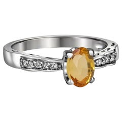 Yellow sapphire, side diamonds 14k gold ring.