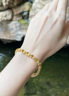 Pulsera de zafiro amarillo engastada en oro de 18 quilates
