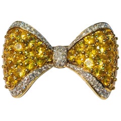 Retro Yellow Sapphire White Diamond 18 Karat Gold Bow Tie Brooch Pin Over 7 Carat