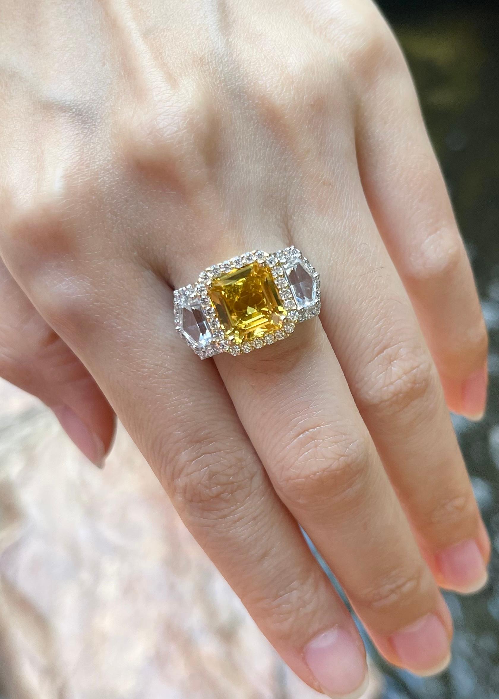 Yellow Sapphire 5.38 carat, White Sapphire 1.98 carats and Diamond 0.88 carat Ring set in 18K White Gold Settings

Width:  2.2 cm 
Length: 1.3 cm
Ring Size: 55
Total Weight: 9.83 grams

