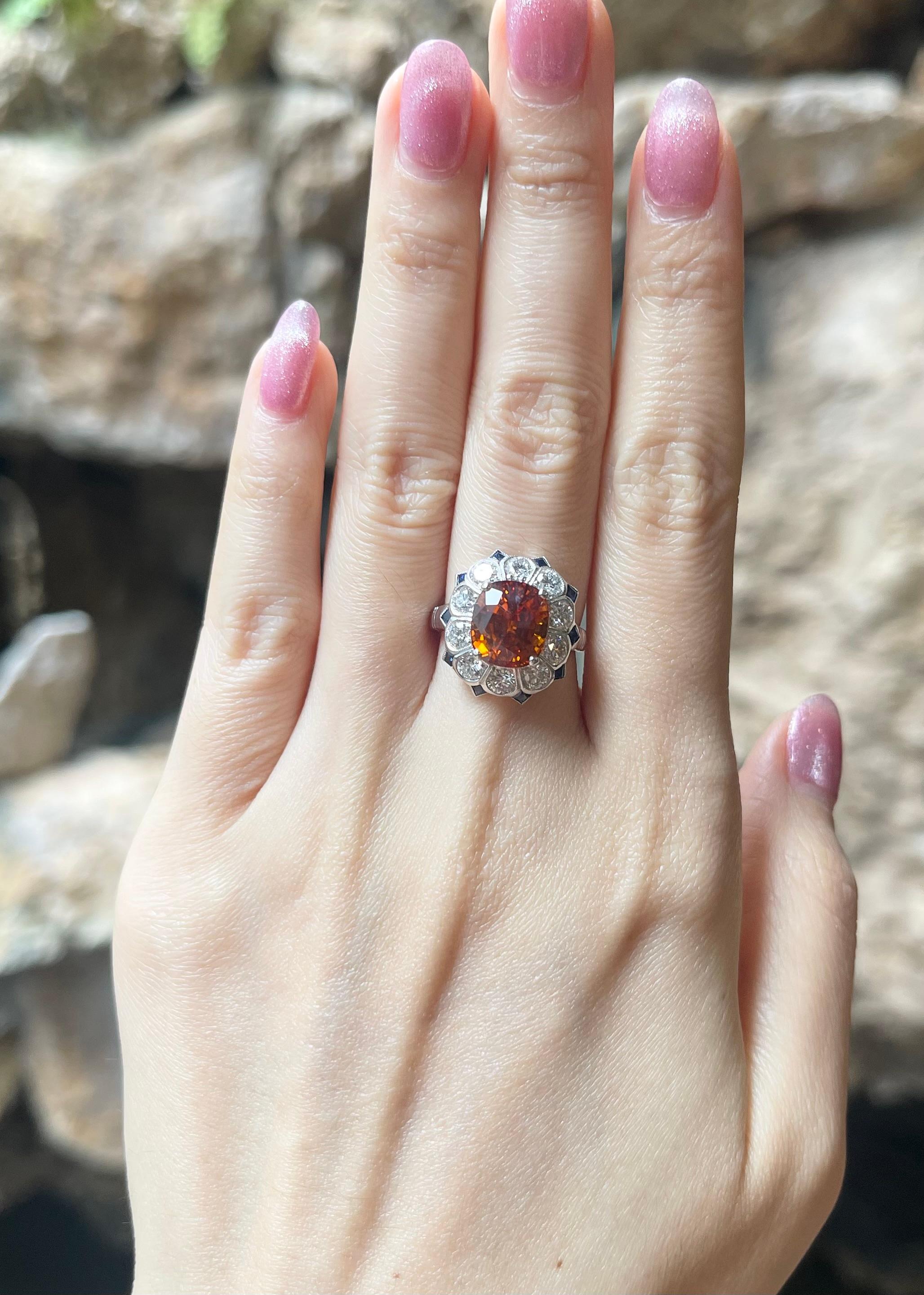 Yellow Sapphire 4.95 carats with Blue Sapphire 0.40 carat and Diamond 1.20 carats Ring set in 18K white Gold Settings

Width:  1.5 cm 
Length: 1.7 cm
Ring Size: 53
Total Weight: 6.05 grams

