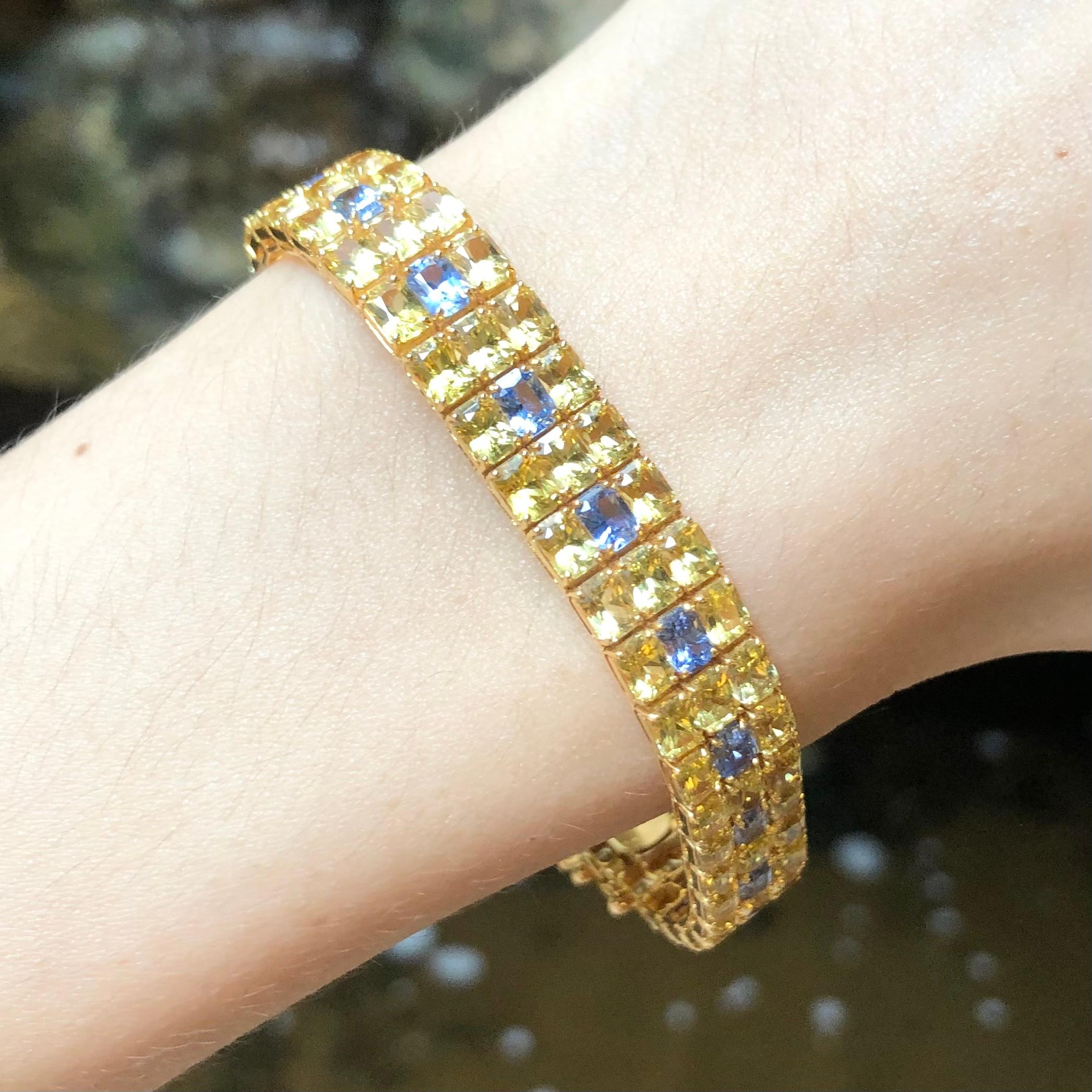 Contemporary Yellow Sapphire with Blue Sapphire Bracelet Set in 18 Karat Gold Settings For Sale