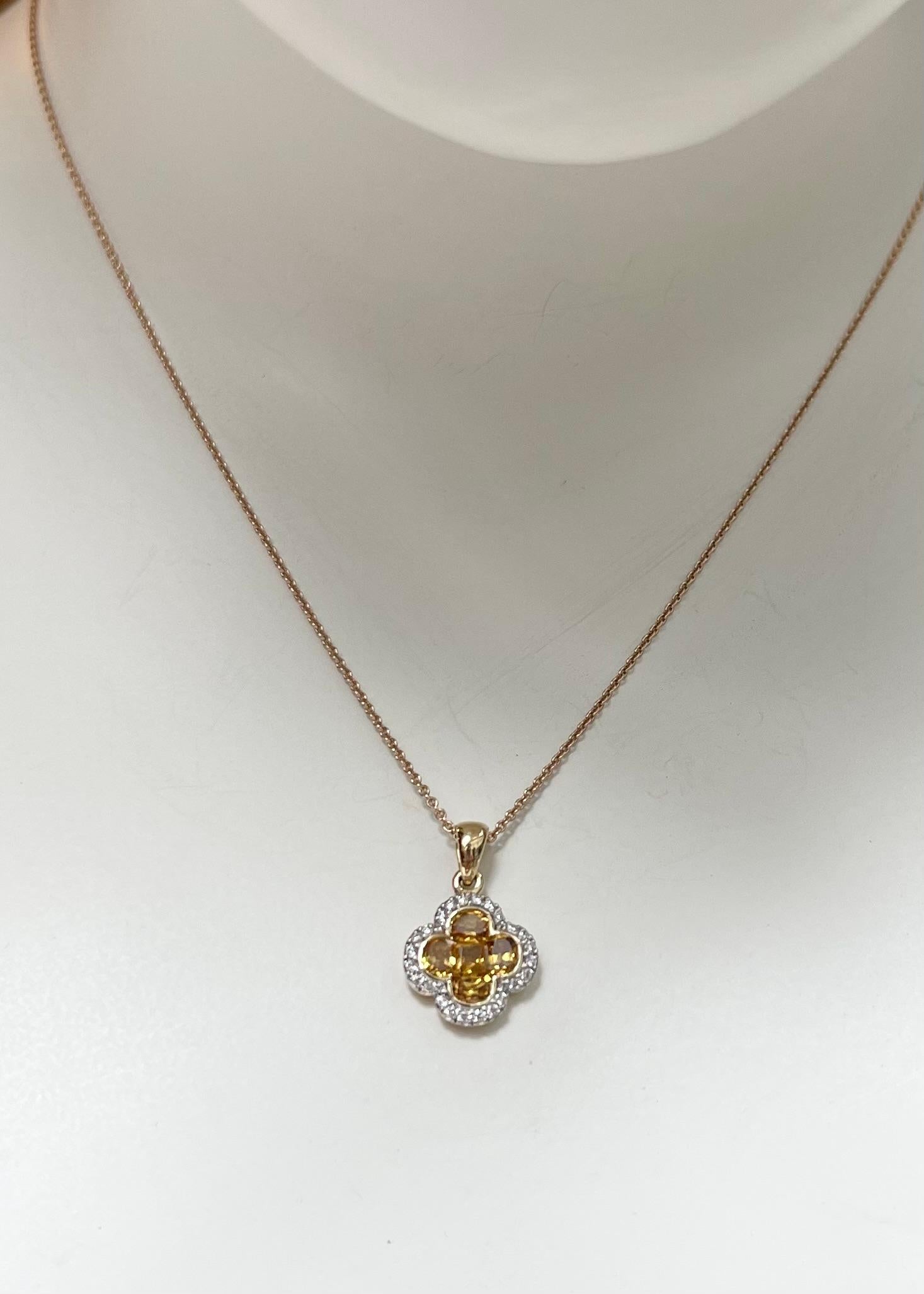 Saphir jaune 0,90 carat et diamant 0,12 carat Pendentif en or 18 carats
(chaîne non incluse)

Largeur : 1.2 cm 
Longueur : 1.7 cm
Poids total : 1.68 grammes

