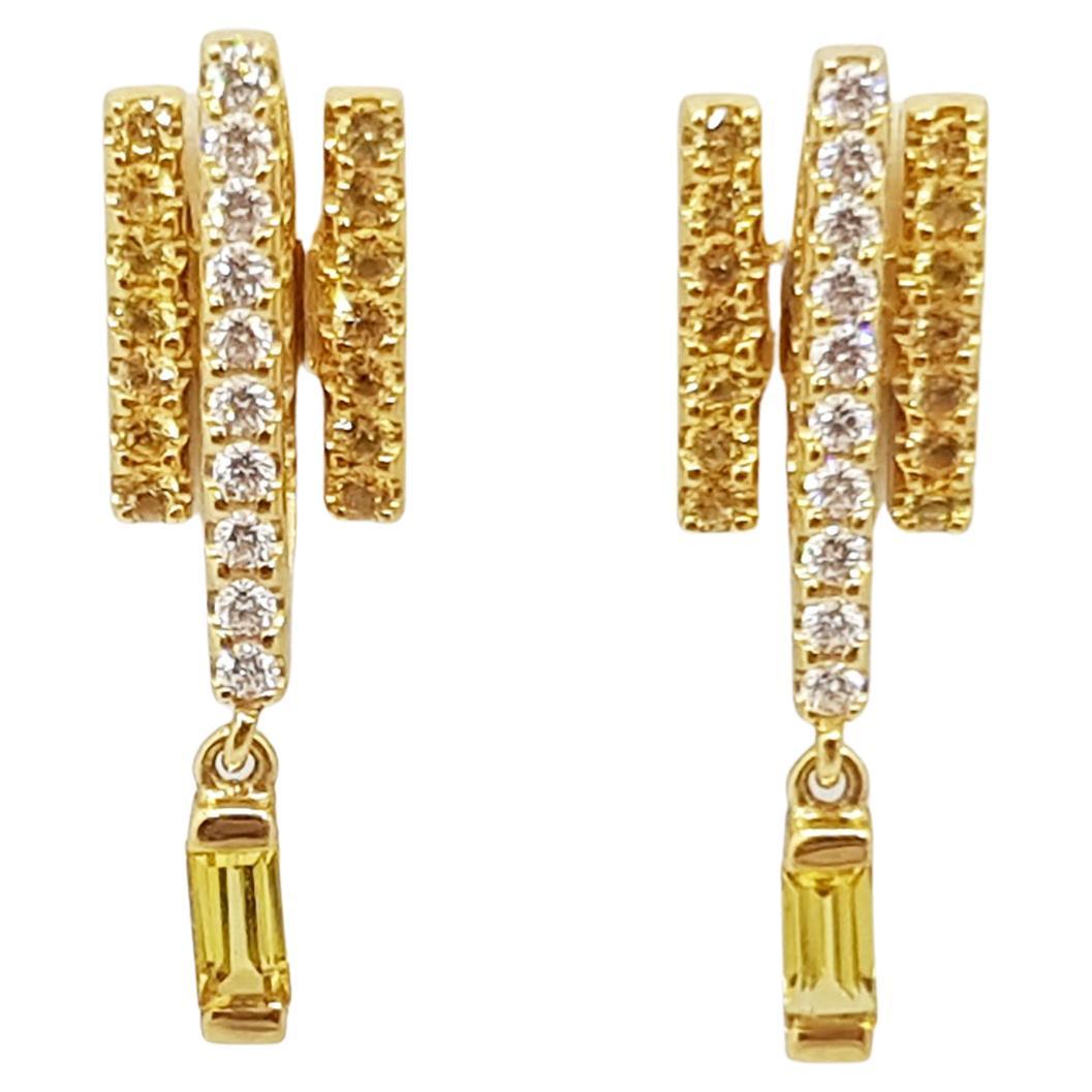 Yellow Sapphire 0.61 carat with Diamond 0.27 carat GeoArt Earrings set in 18 Karat Gold Settings by Kavant & Sharart

Width:  0.7 cm 
Length:  2.4 cm
Total Weight: 4.95 grams

