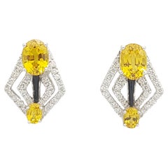 Yellow Sapphire with Diamond Earrings Set in 18 Karat White Gold Settings