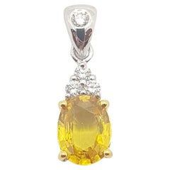 Yellow Sapphire with Diamond Pendant Set in 18 Karat White Gold Settings