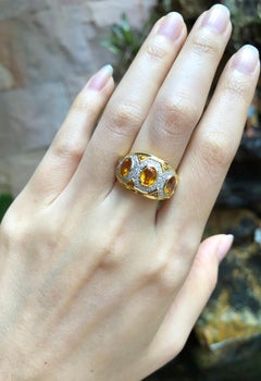 Yellow Sapphire with Diamond Ring Set in 18 Karat Gold Settings