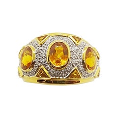 Bague en or 18 carats sertie d'un saphir jaune et de diamants