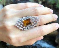 Yellow Sapphire with Diamond Ring Set in 18 Karat White Gold Settings