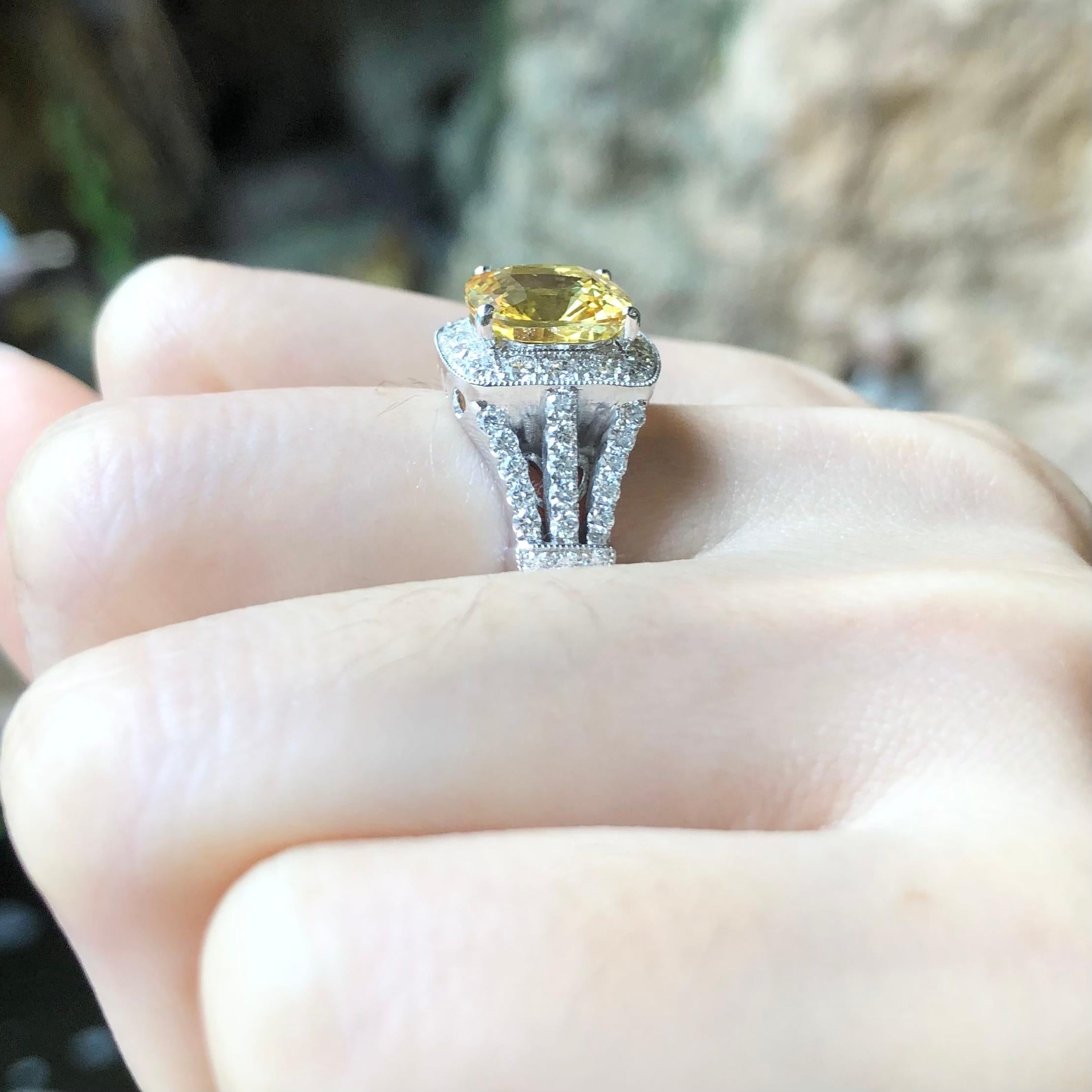 Contemporary Yellow Sapphire with Diamond Ring Set in 18 Karat White Gold Settings For Sale