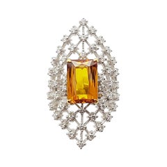 Yellow Sapphire with Diamond Ring Set in 18 Karat White Gold Settings
