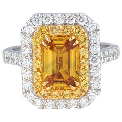 Bague en or blanc 18 carats avec saphir jaune et diamant