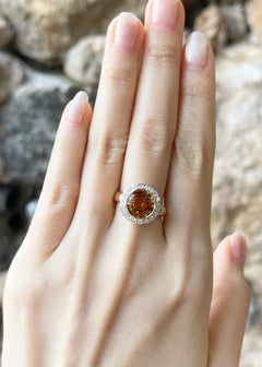 Yellow Sapphire with Diamond Ring set in 18K Gold Setting