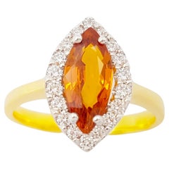Bague en saphir jaune et diamant sertie en or 18K
