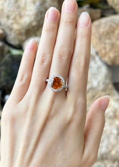Yellow Sapphire with Diamond Ring Set in 18k White Gold Settings