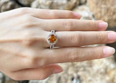 Yellow Sapphire with Diamond Ring Set in 18k White Gold Settings