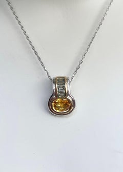 Yellow Sapphire with Green Sapphire Pendant set in 18K Yellow/White Gold Setting