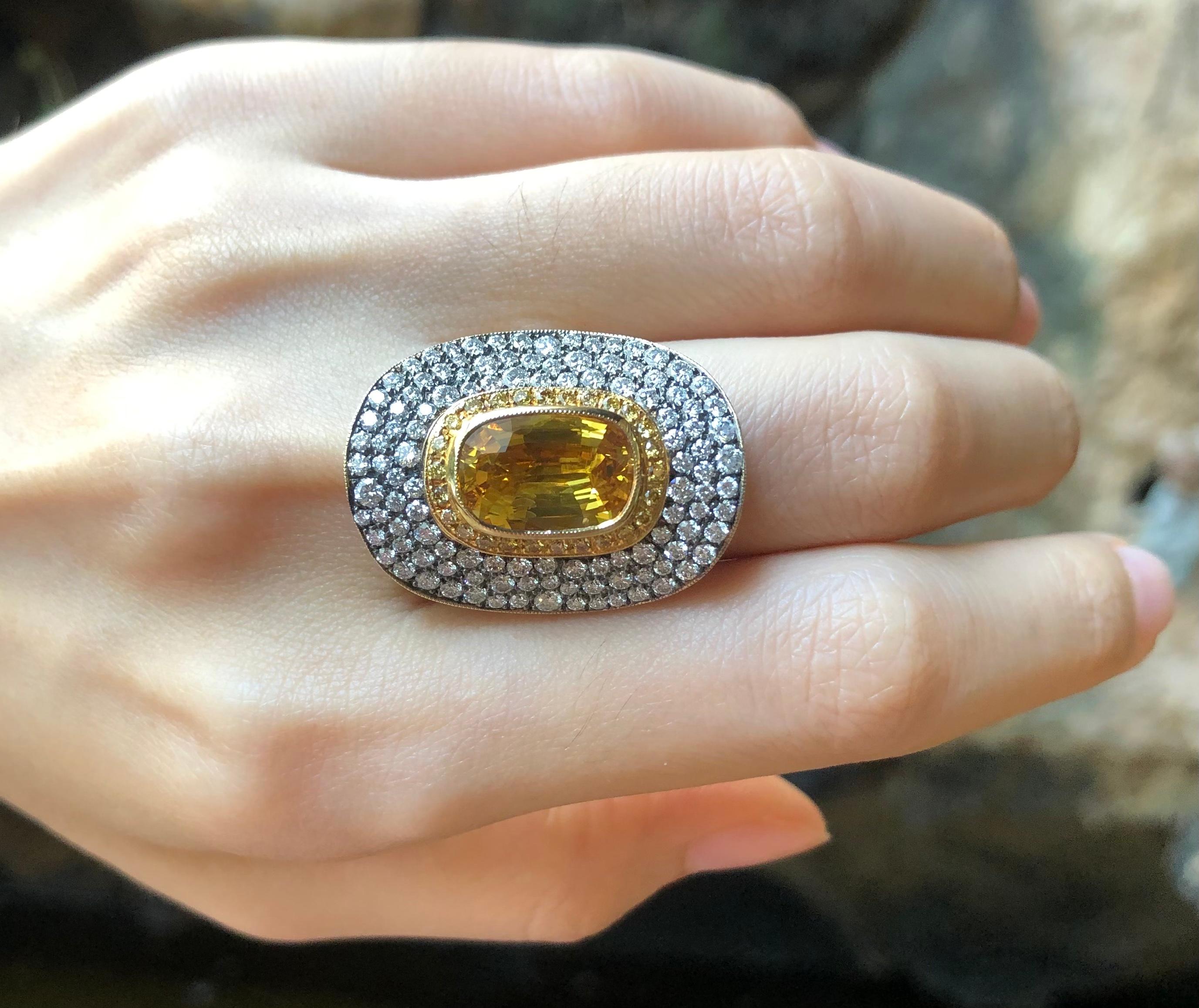 Contemporary Yellow Sapphire with Yellow Diamond and Diamond Ring Set in 18 Karat Gold For Sale