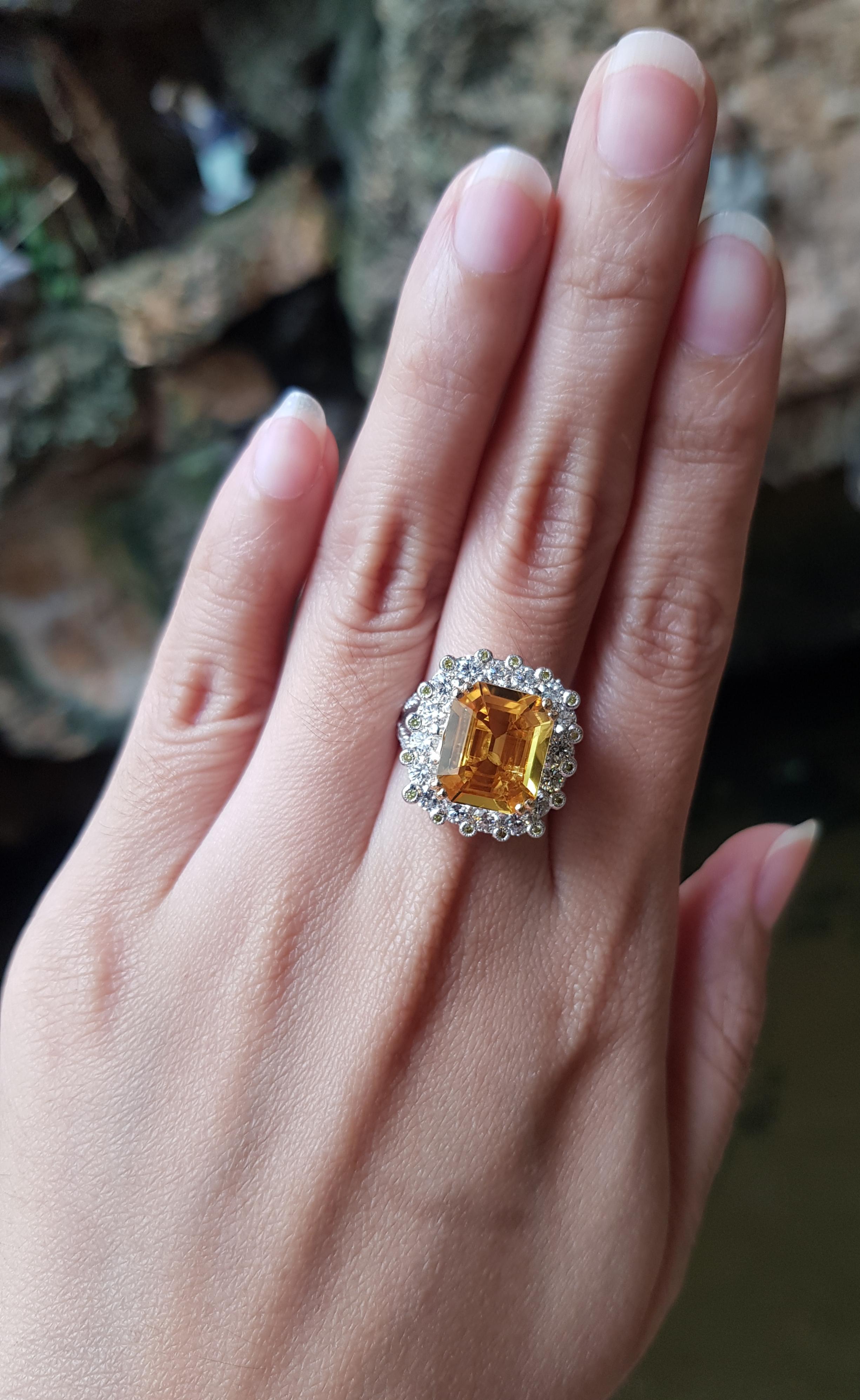 Contemporary Yellow Sapphire with Yellow Diamond and Diamond Ring Set in 18 Karat White Gold For Sale