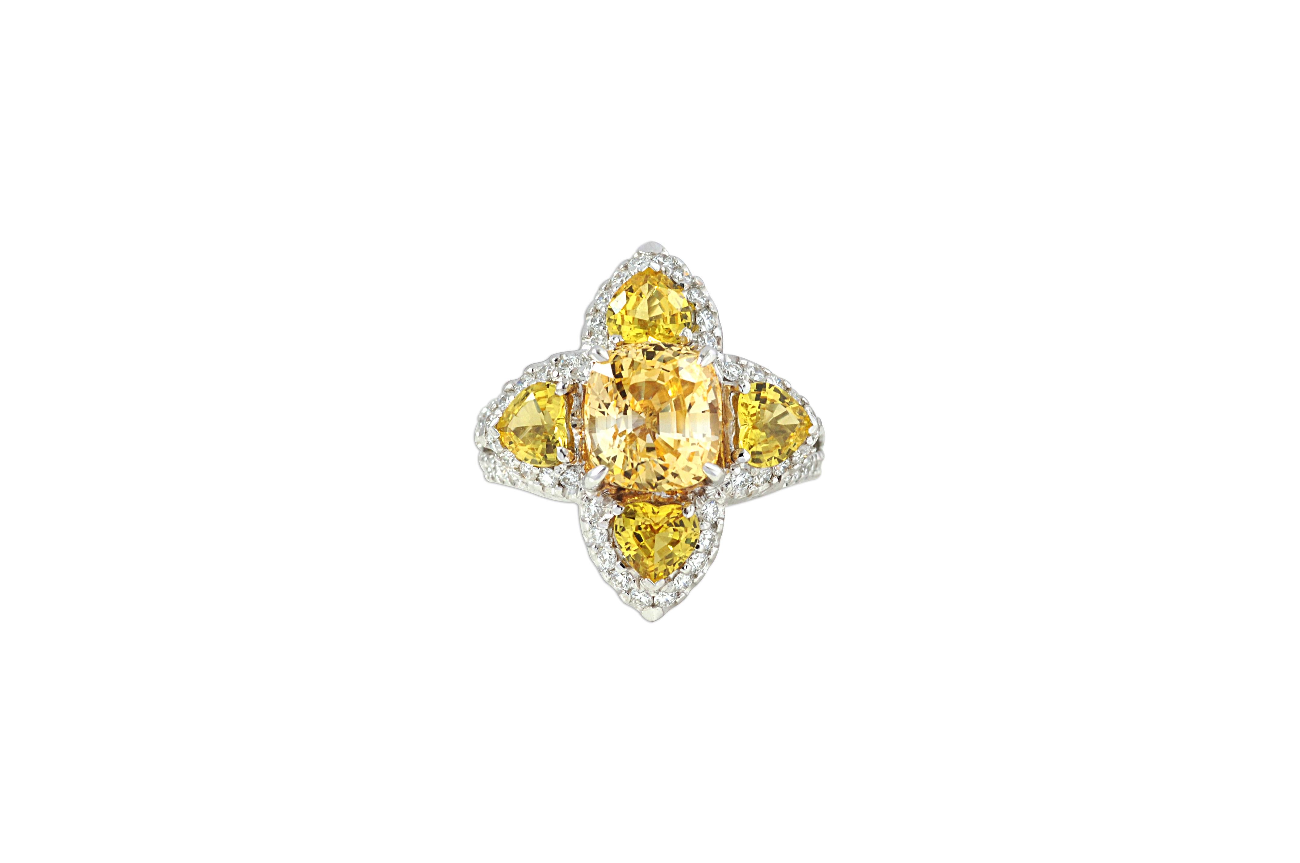 Yellow Sapphire 4.32 carats, Yellow Sapphire 2.20 carats with Diamond 0.84 carat Ring Set in 18 Karat White Gold Settings

Width: 2.3 cm
Length: 2.3 cm
Ring Size: 55
Total Weight: 12.18 grams

