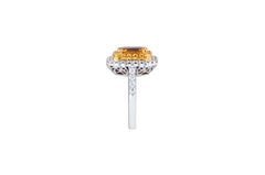 Yellow Sapphire with Diamond Ring Set in 18 Karat White Gold Settings