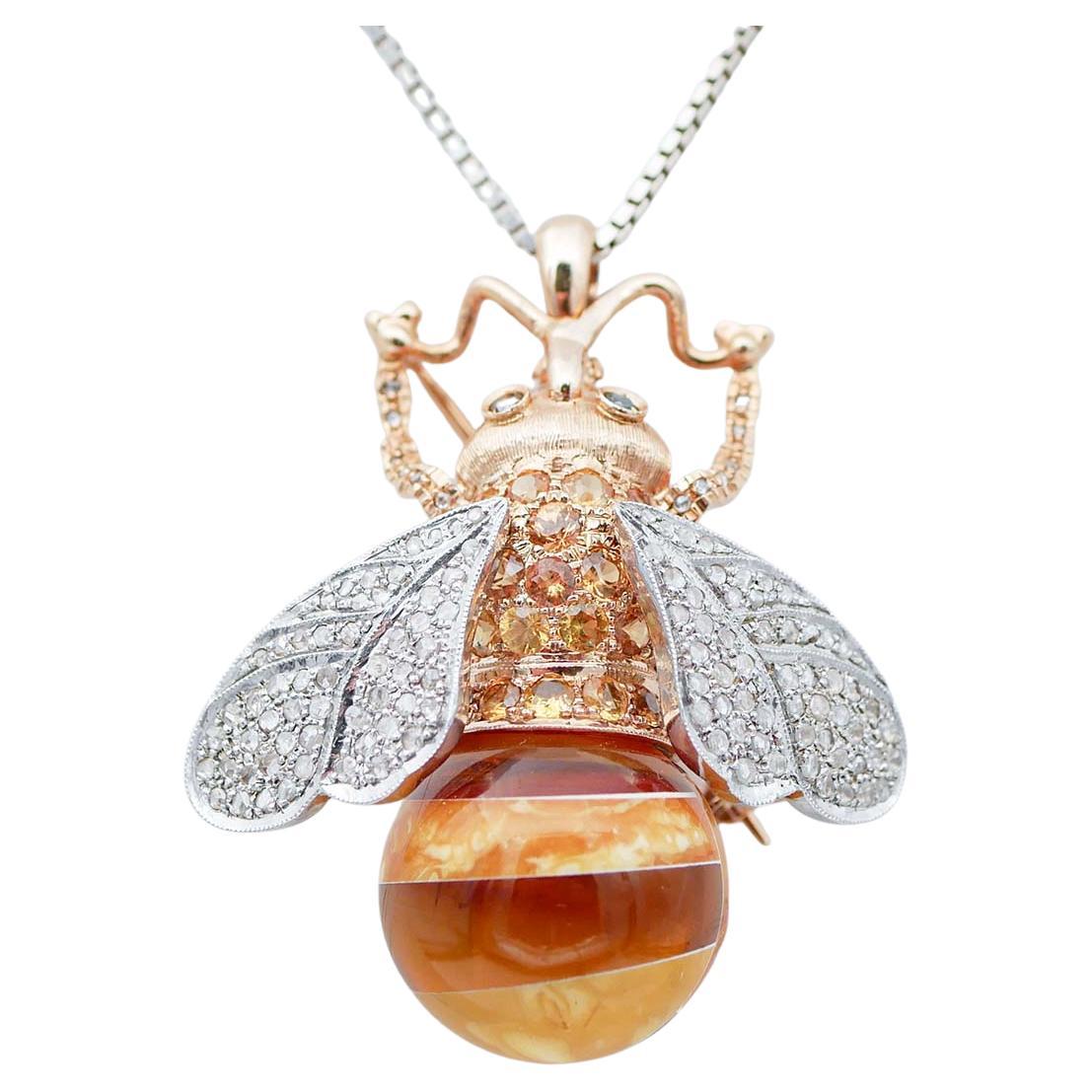 Collier pendentif abeille en or rose et argent avec saphirs jaunes, diamants et ambre