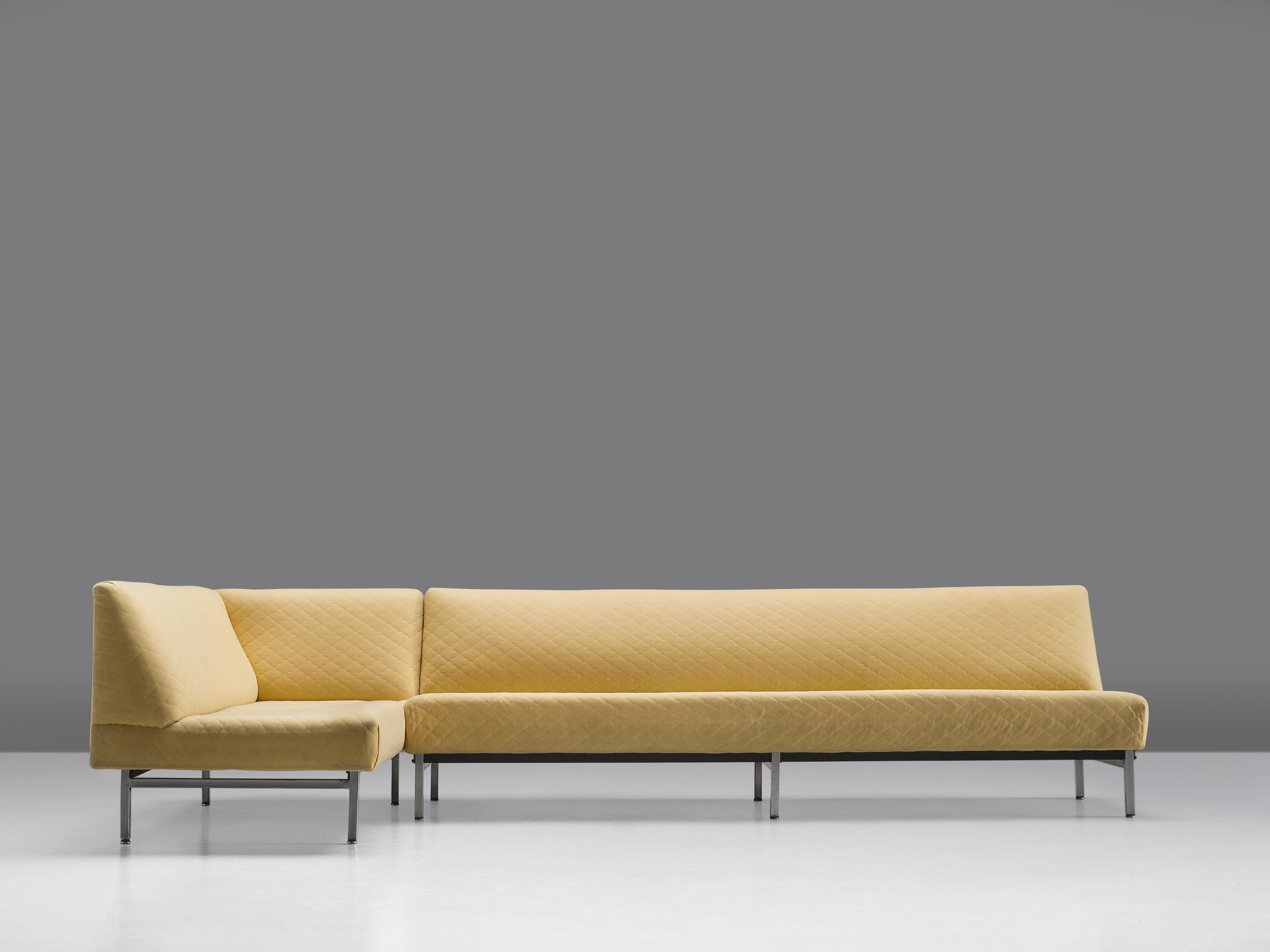 Modular sectional sofa, structured yellow upholstery, metal, United States, 1960s

This two-part sofa is upholstered in soft yellow structured fabric that emphasizes the strong lines of the piece. The two different parts can be placed together to