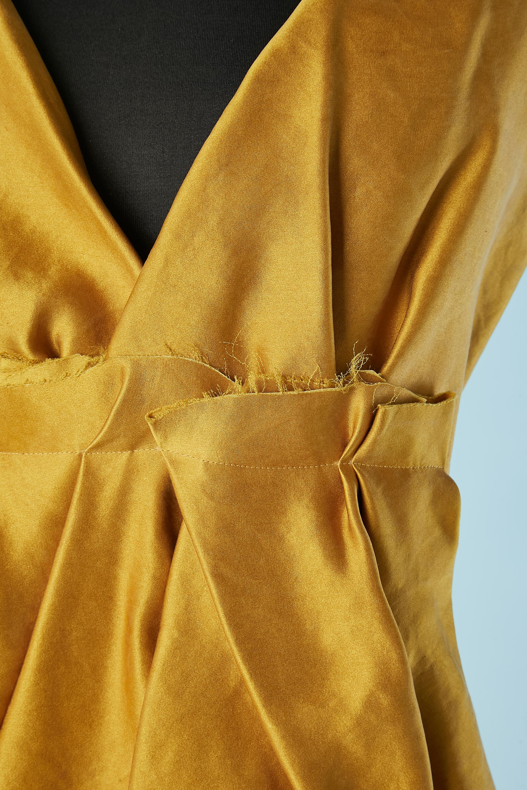 Yellow silk sleeveless drape cocktail dress. Raw cut on the edge. Silk lining.
Gros-grain on the waist ( inside) 
SIZE 40