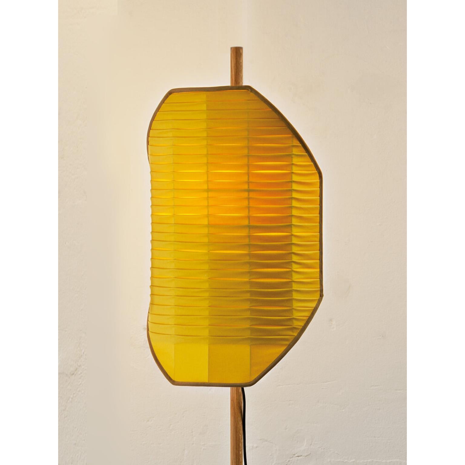 Yellow Single Pleating Flag Floor Lamp by Servomuto
Dimensions: W 45 x D 33 x H 194 cm
Materials: Lampshade: Pleated Cotton Fabric. Structure: Tropicalizated iron bracket, oak wood stem, “Ceppo Lombardo” natural stone base.
Weight: 16 Kg. 

Inspired