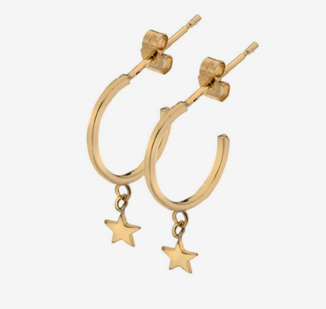 Boucles d'oreilles étoile jaune Unisexe en vente