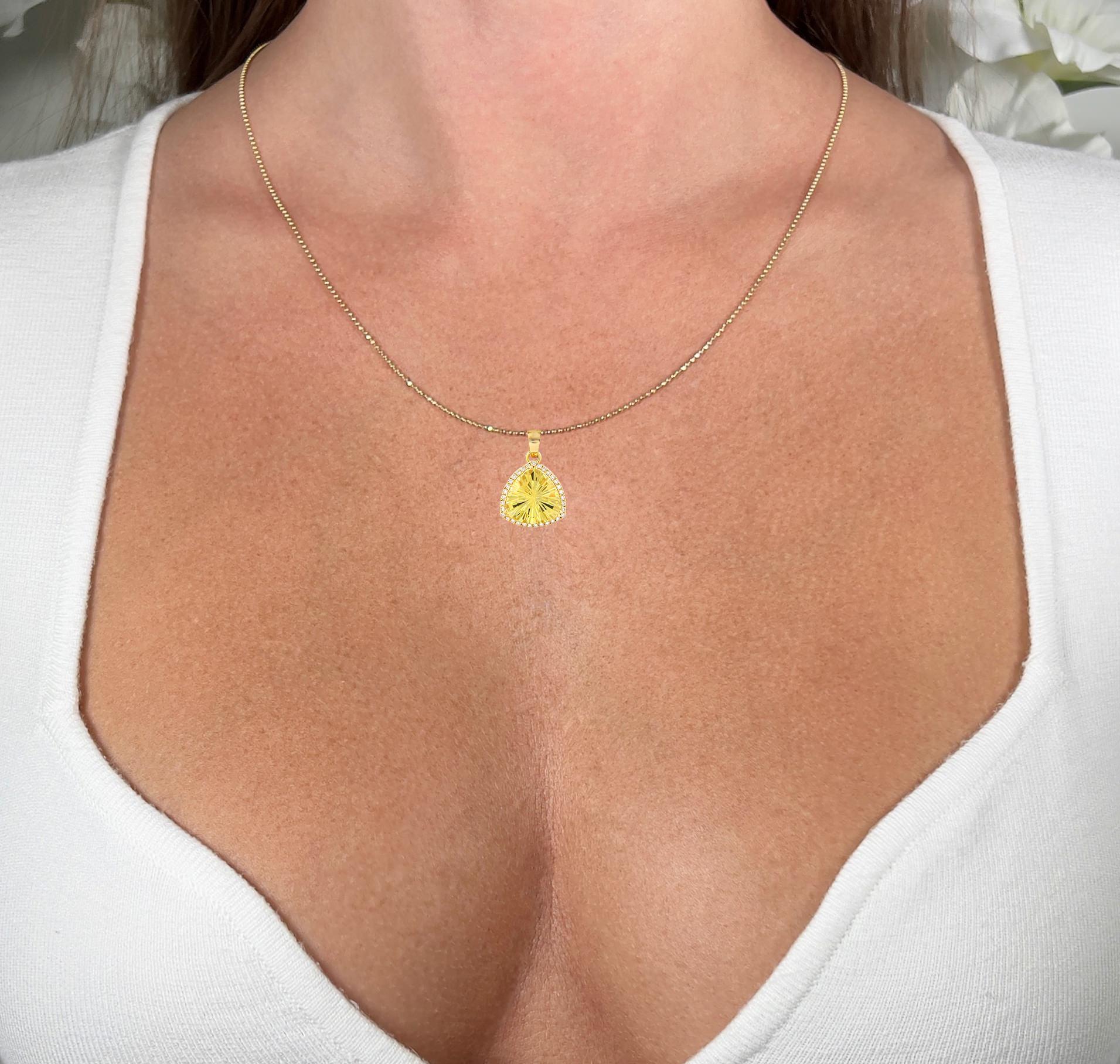 It comes with the Gemological Appraisal by GIA GG/AJP
All Gemstones are Natural
Yellow Quartz = 5.38 Carats
Diamonds = 0.25 Carats
Metal: 18K Yellow Gold
Pendant Dimensions: 22 x 15 mm