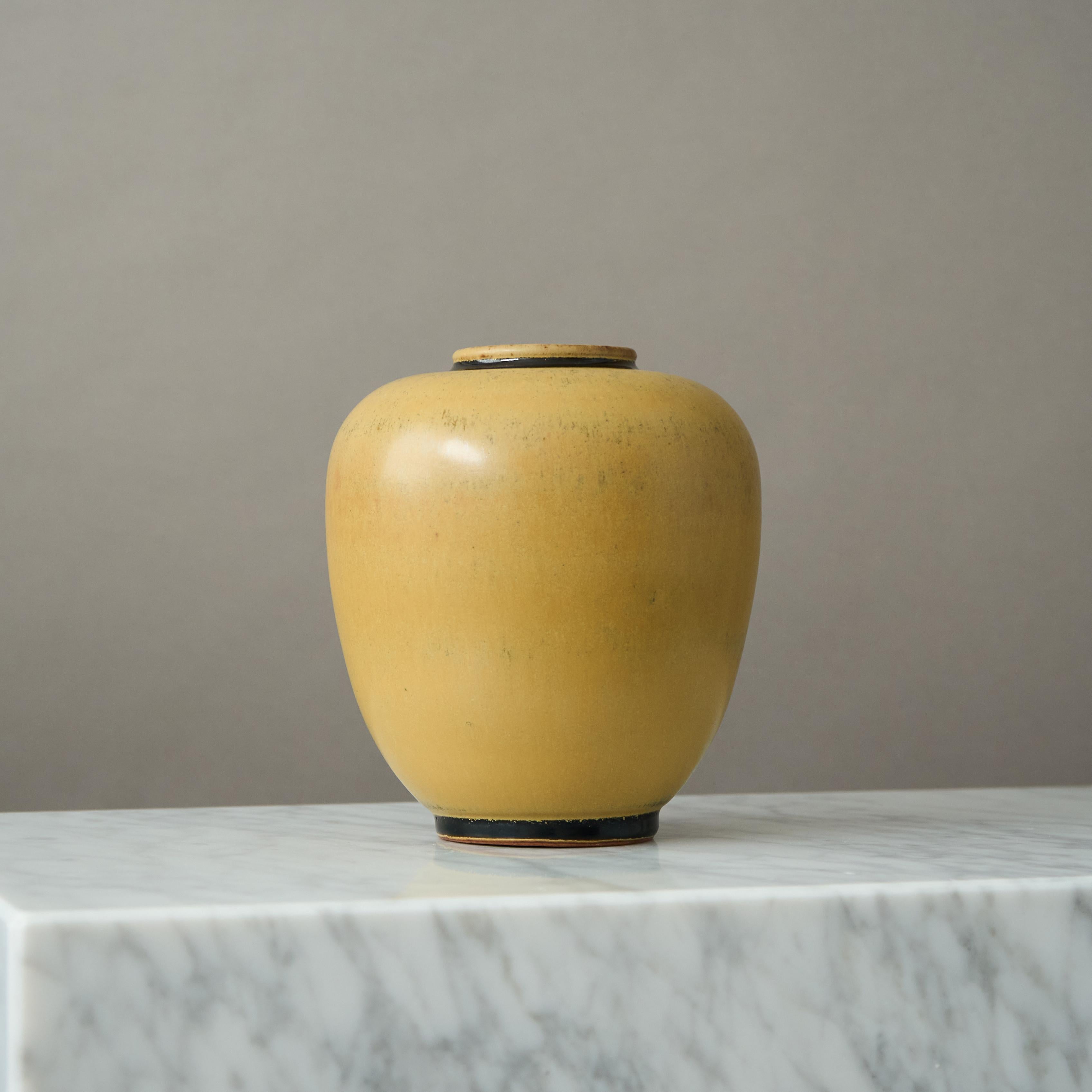 Beautiful stoneware vase made by master ceramists Erich and Ingrid Triller.
This piece was created at their workshop in Tobo, Sweden, 1950’s.

Excellent condition.
Signed on the base with their customary 
