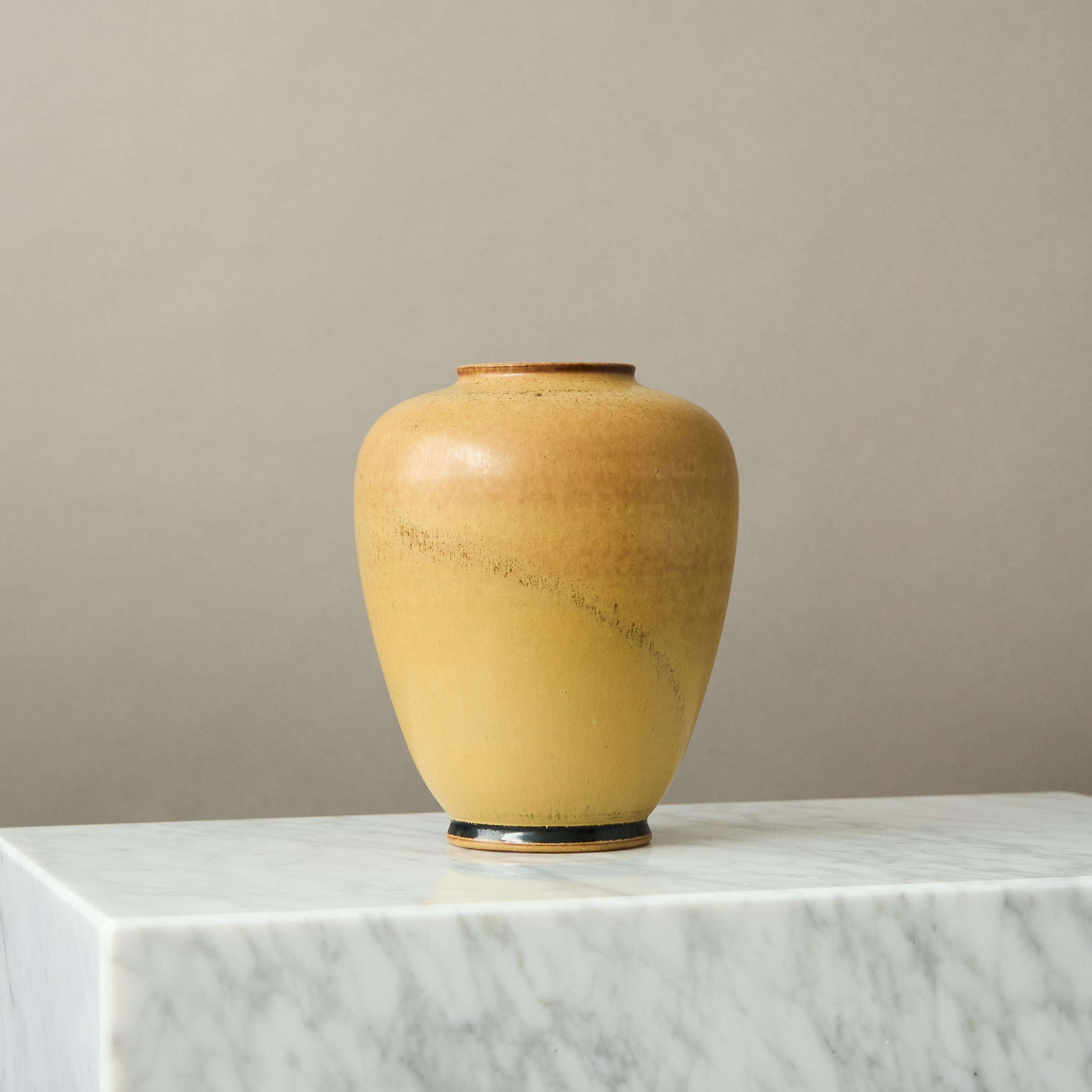 Beautiful stoneware vase made by master ceramists Erich and Ingrid Triller.
This piece was created at their workshop in Tobo, Sweden, 1950’s.

Excellent condition.
Signed on the base with their customary 