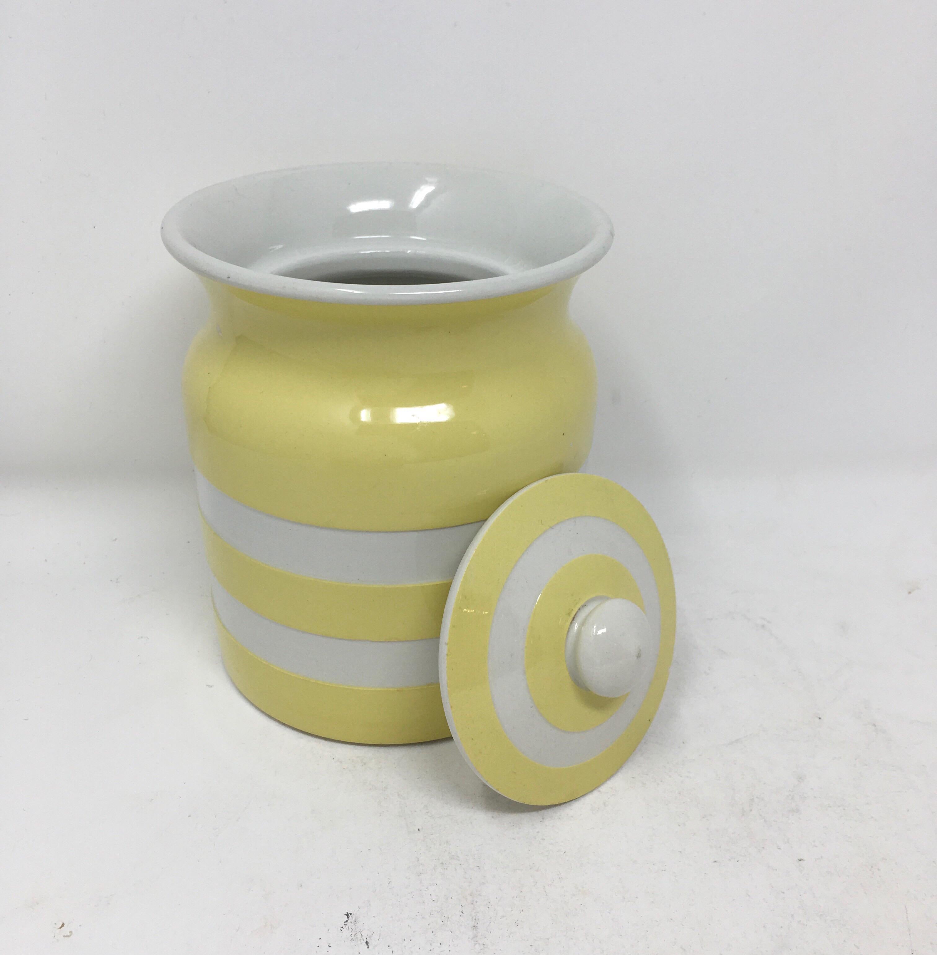 Found in England, this small size Cornish Kitchen Ware ceramic storage cannister with lid is from makers TG Green, and is in the much rarer yellow color (most often you see these in blue). Made between the 1930s-1950s, this original vintage jar with