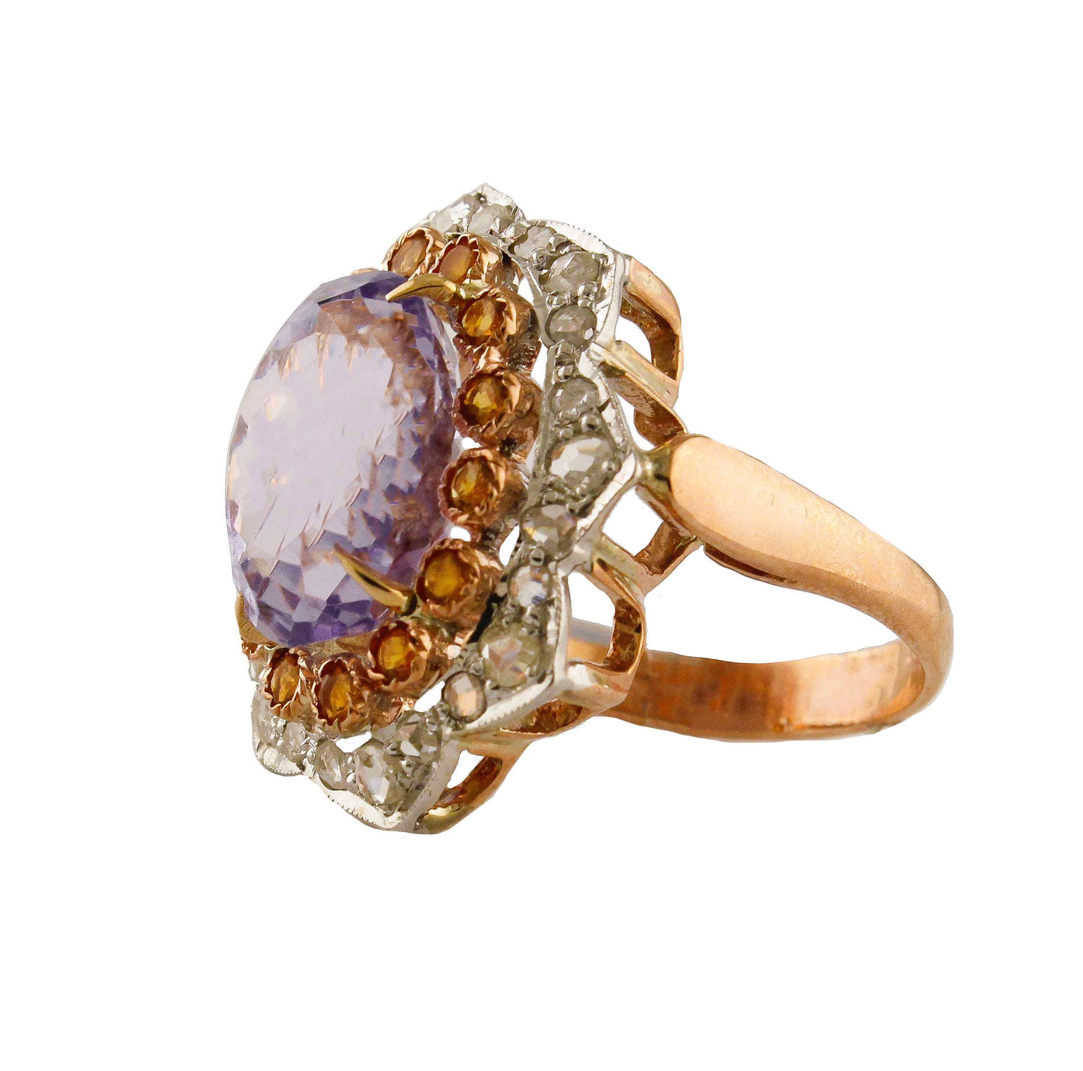 Amazing flower ring in 9 kt rose gold and silver,  with a beautiful central amethyst surrounded by yellow topazes and diamonds 
Amethyst Topaz ct 8.09   / amethyst 1.9 cm X 1 cm
Diamonds ct 0.77
Italian size 16.5
French size 56.5
Usa size 