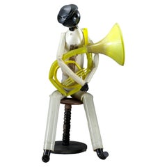Escultura Tubista amarillo, Ensamblaje de plástico, 2004 por Jerry Ross Barrish