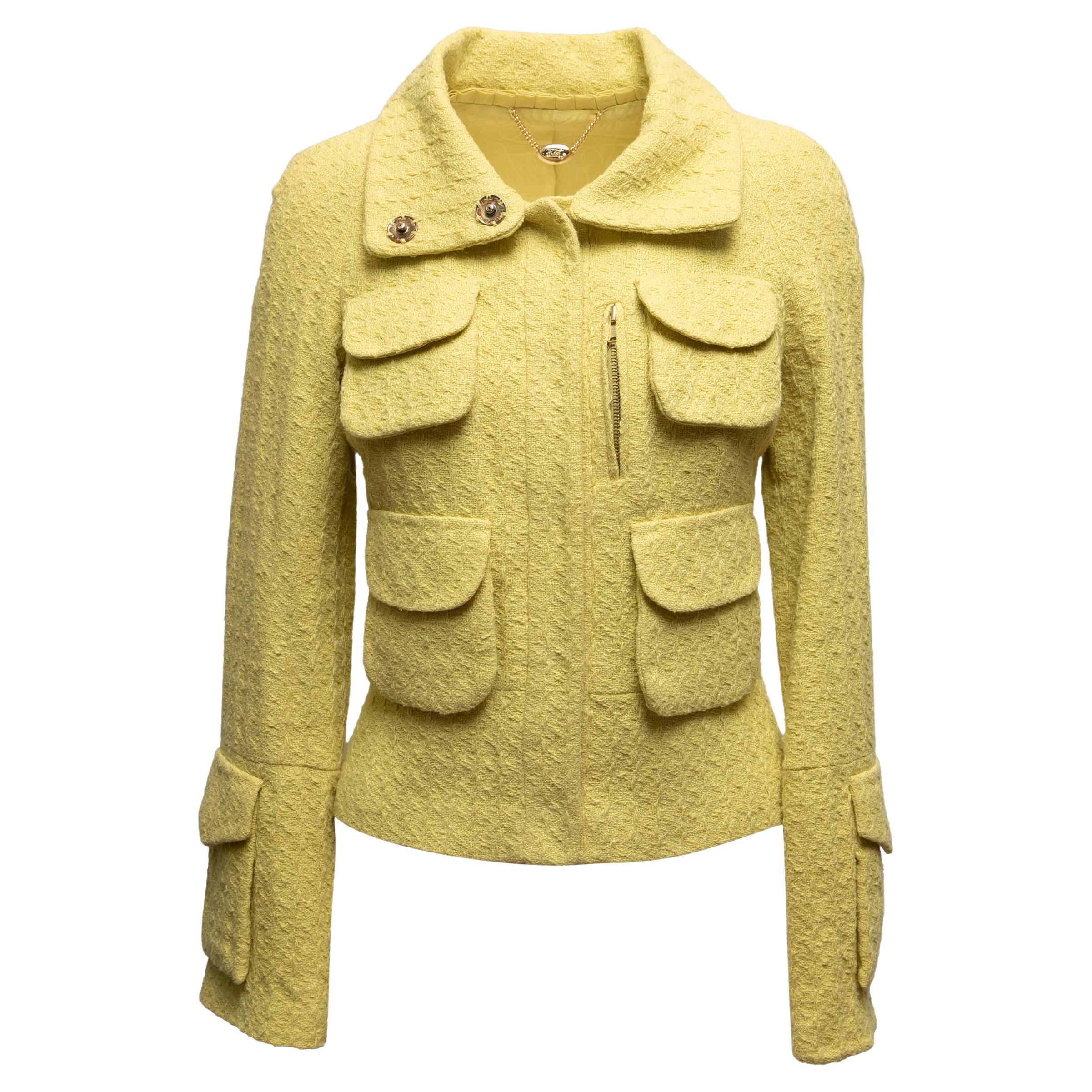 Veste cargo jaune à col montant de Tuleh. Quatre poches sur le devant. Fermeture à glissière sur le devant. Poitrine 32
