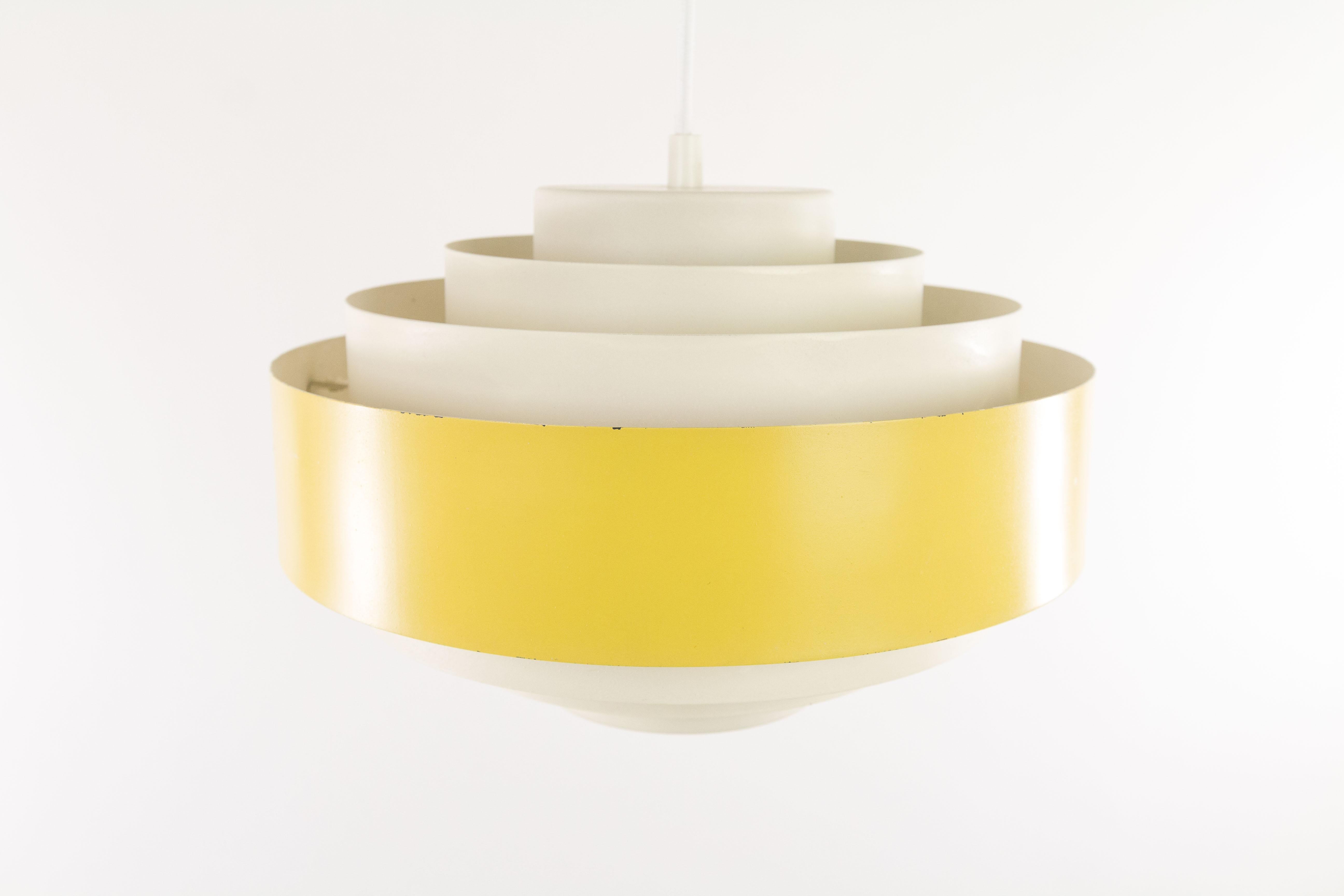 This ultra pendant light was designed by Jo Hammerborg for Fog & Mørup in the early 1960s.

The lamp consists of seven rings. It is closed towards the top and at the bottom it is open. Ultra was made in various combinations of colors and