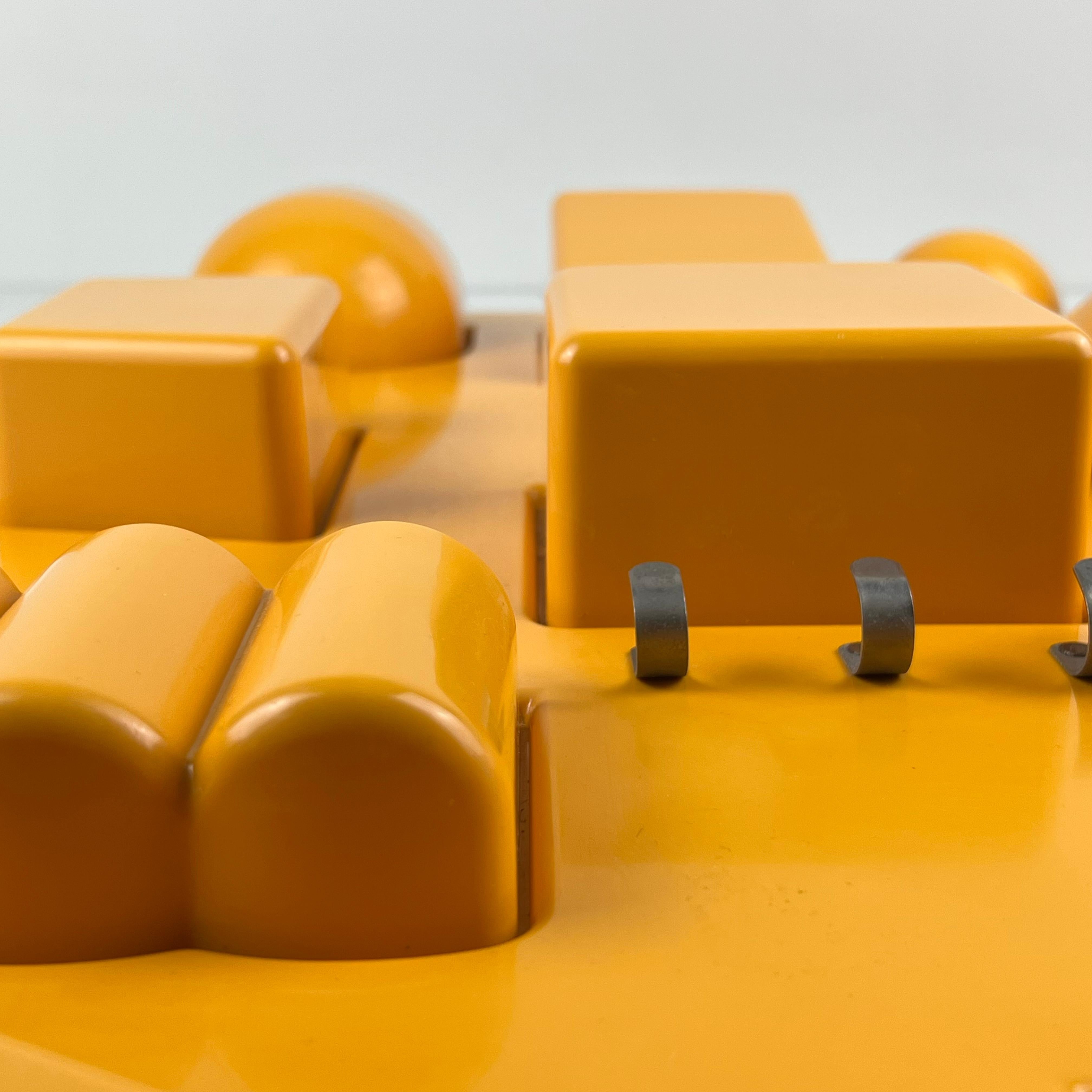 Yellow “Utensilo” Plastic Wall Storage Unit designed by Dorothee Maurer Becker  1