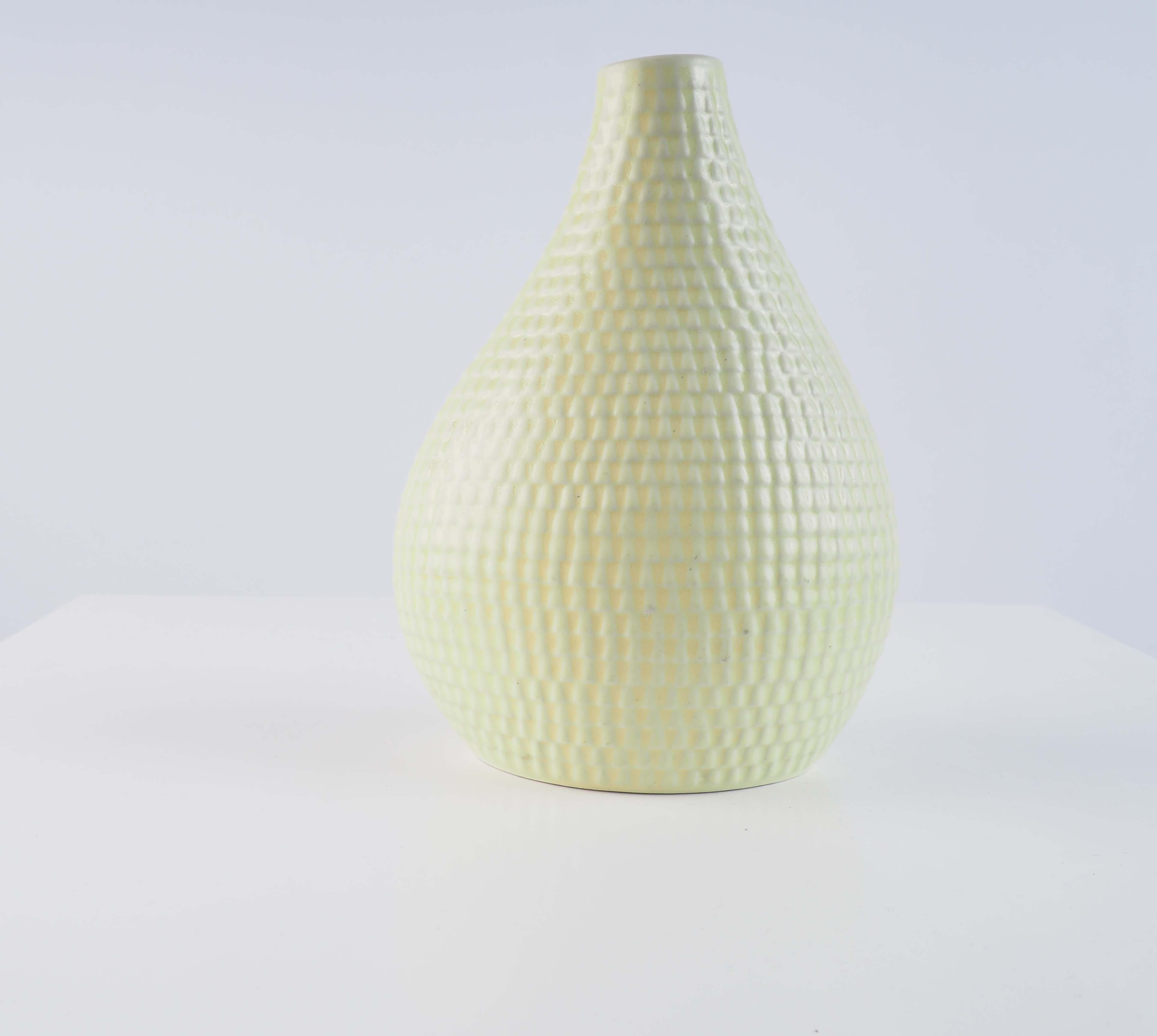 Yellow vase from the Reptile series by Stig Lindberg, Gustavsberg, Sweden.
 