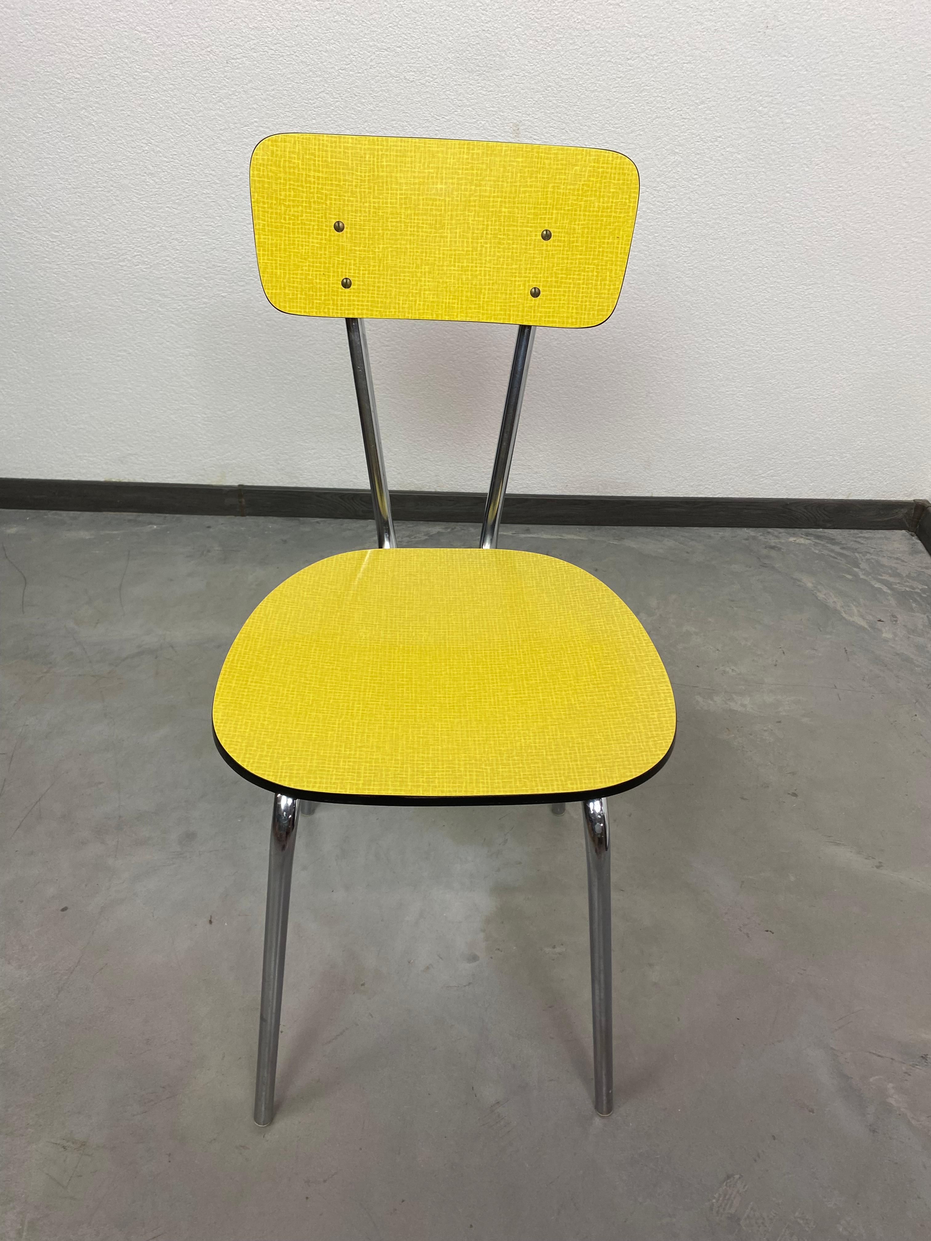 Yellow vintage dining chair in very good original condition.