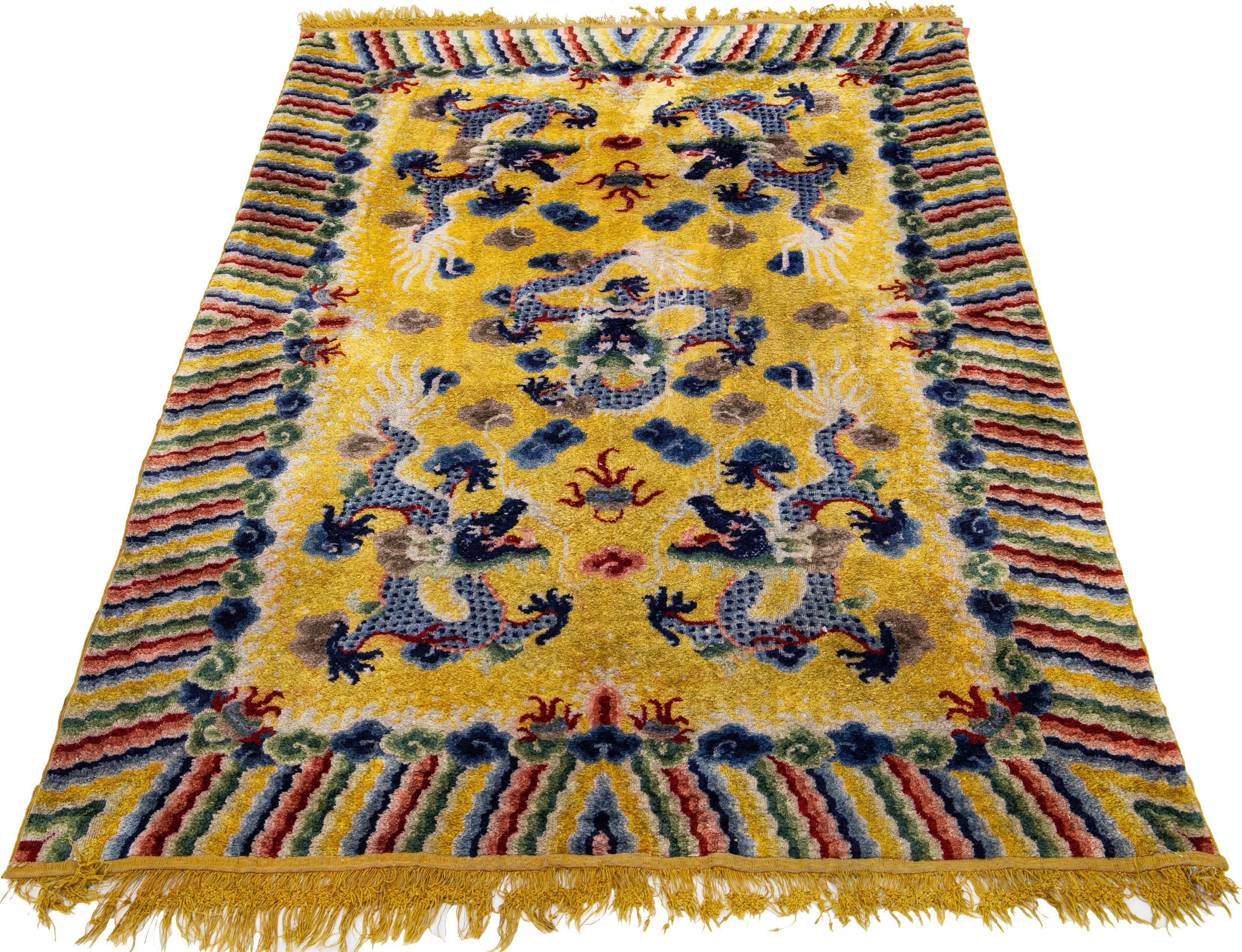 Chinese Export Yellow Vintage Peking Chinese Handmade silk Rug With Traditional Dragon Design For Sale