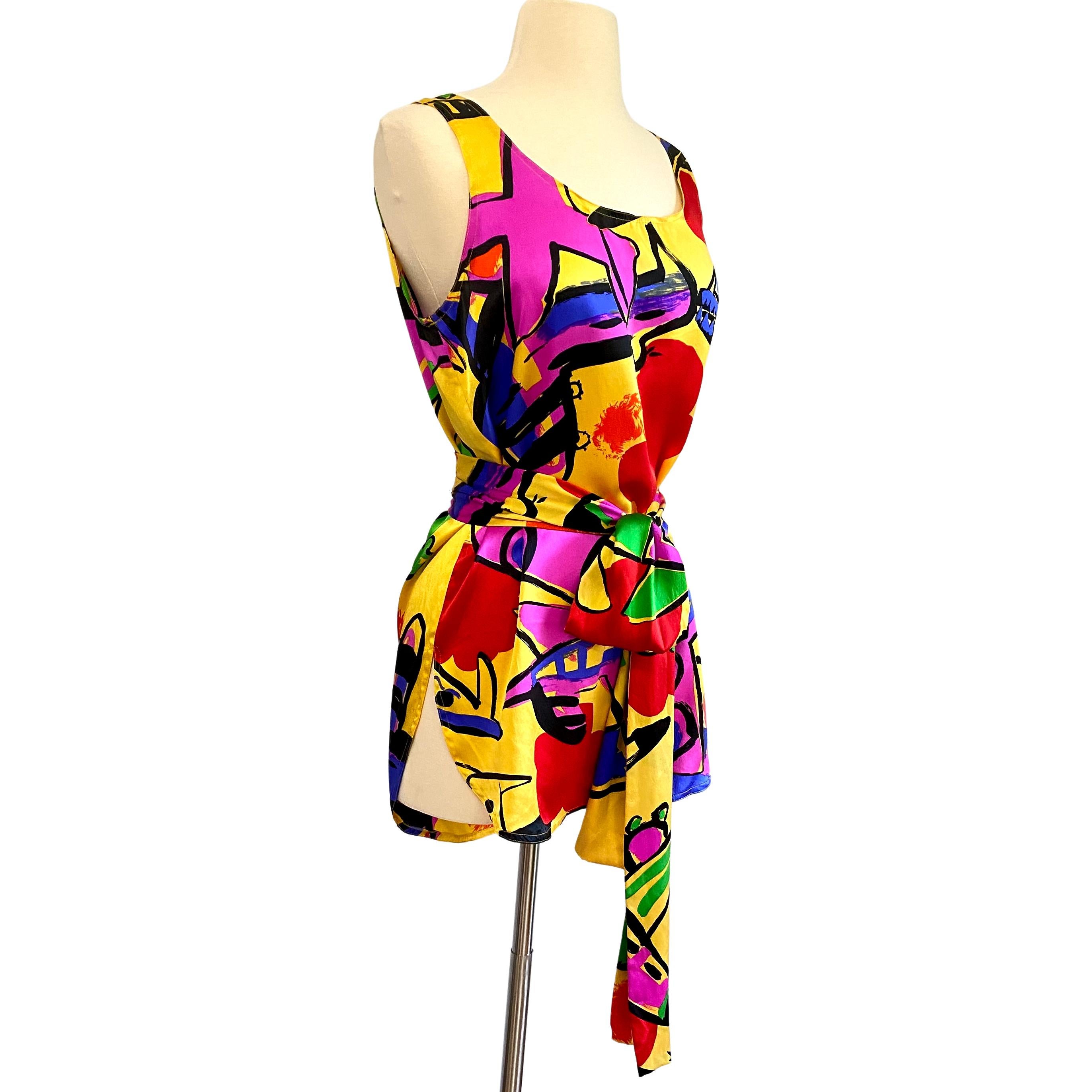 Easy cool silk slip dress in Flora's wearable pop art print.
Dress only. Sash is a part of the kimono which is listed separately.
Size reads p but it's a S/M. Approximately 29