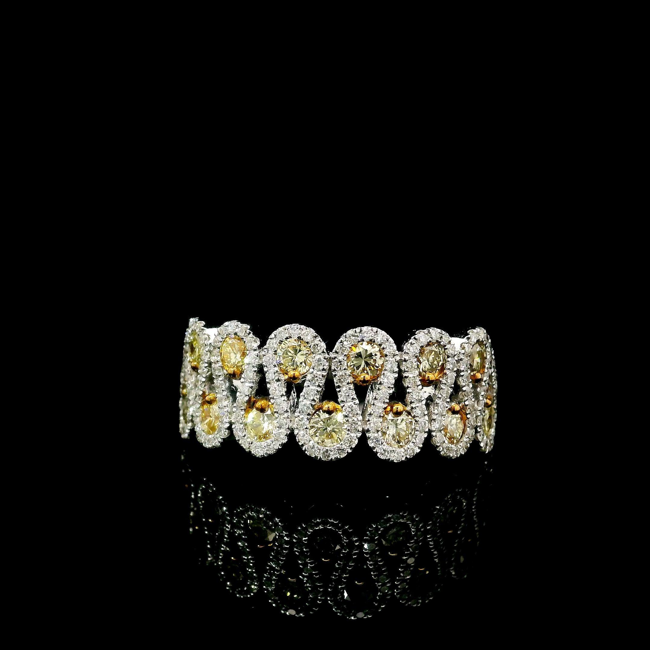 18kt white gold ring with diamonds
  
  Gold colour & Carat: White gold 18kt
  Weight: 2.63 grams

  Surrounding Stones: Diamonds
 1) White Diamonds
  Carat weight: 0.39 ct (135 pcs)
  Color: F
  Clarity: VS1/VS2
  Cut: Round

2) Yellow Diamonds
 