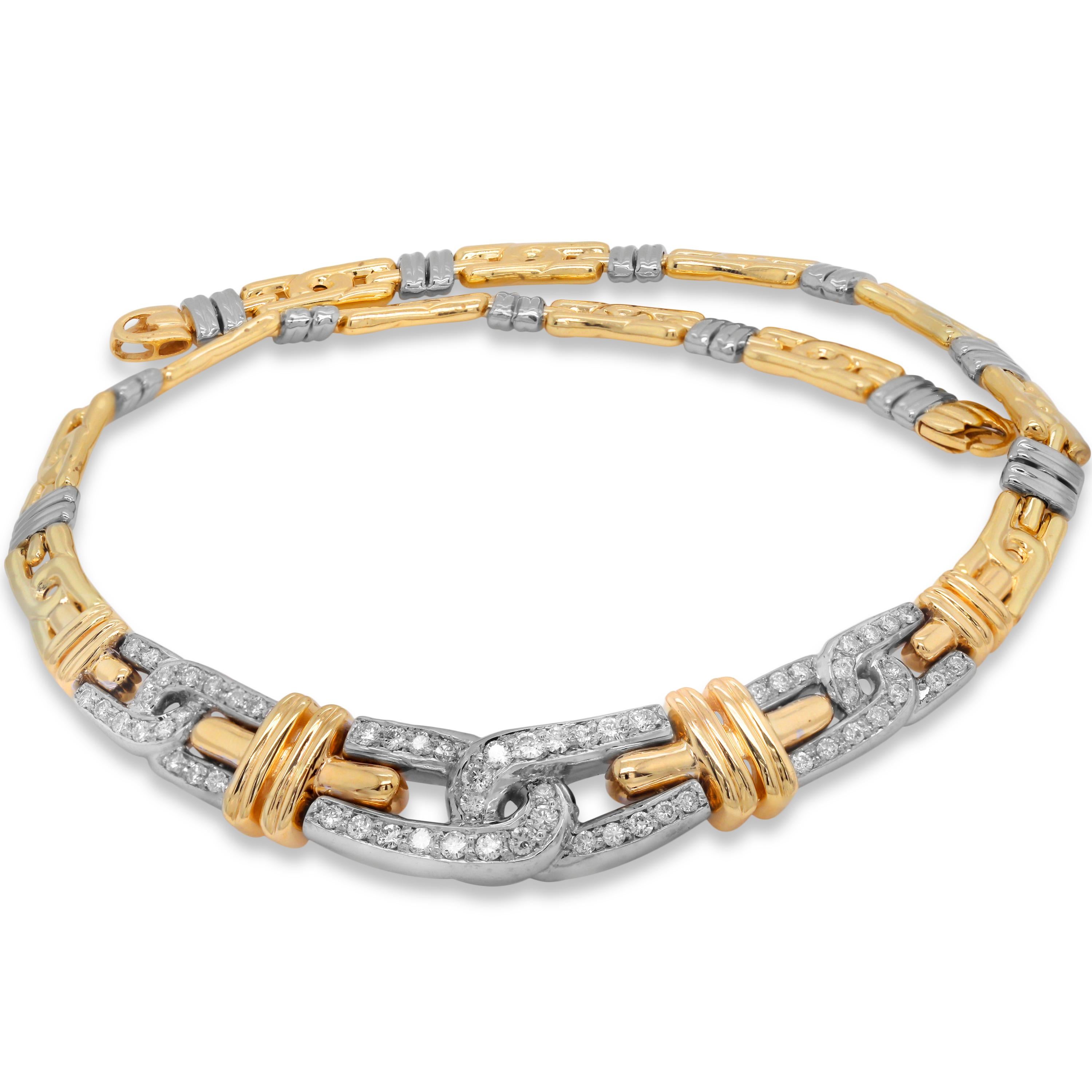 14K Yellow and White Gold and Diamond Choker Necklace

Apprx. 2.25 carat G color, VS clarity diamonds total weight

16 inchs in length.

Necklace uses a lobster clasp for secure clasping.

Made in Italy