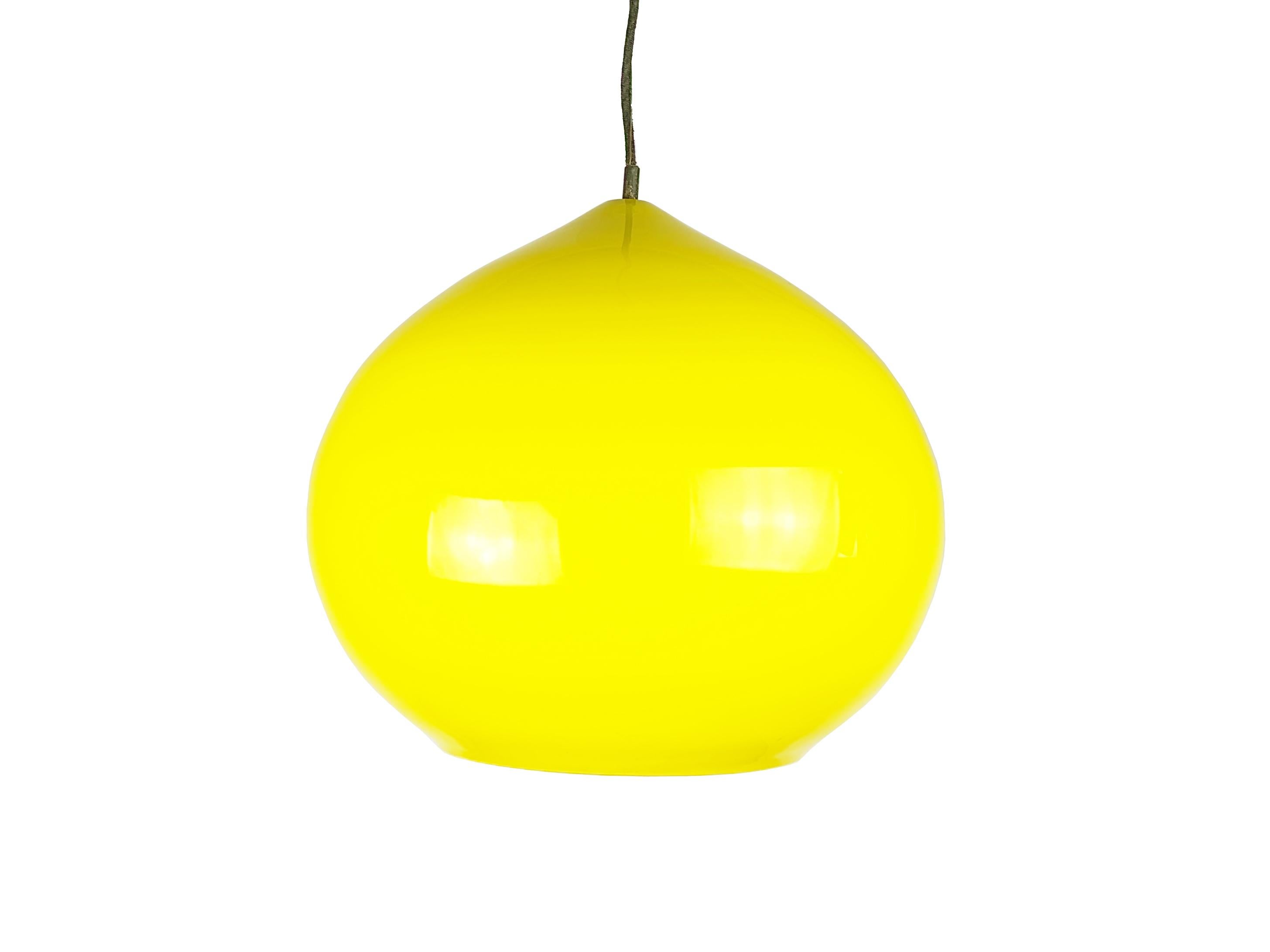 This pendant lamp was produced approximately in the 1960s. It is made of metal structure with a beatiful 