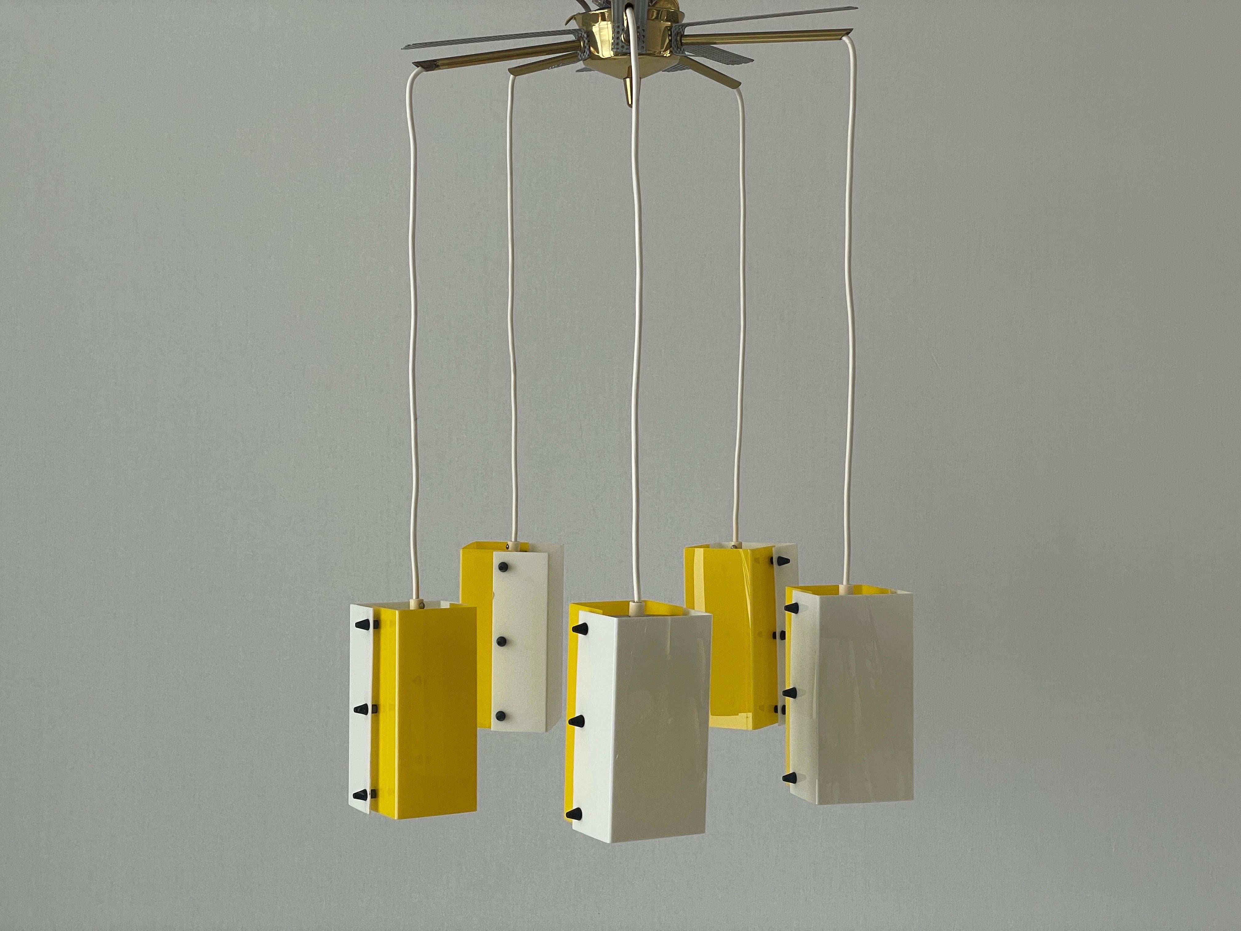 Yellow-White Plexiglass 5-shade Chandelier, 1950s, Germany
New old stok
4 available in stock.
Designed and manufactured by Schmelzer Leuchten

Lampshade is in very good vintage condition.

This lamp works with  5x E14 light bulbs. 
Wired and