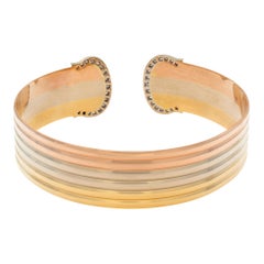 Yellow, white, & rose gold "C de Cartier" tricolor cuff bangle w/ pave diamond